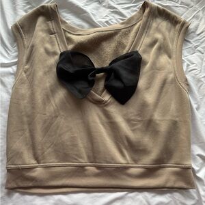 Tan Sleeveless Top with Black Bow On The Back